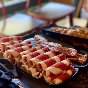 a variety of meats and sausages