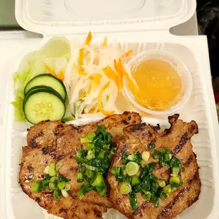 a meal in a styrofoam container