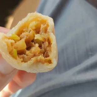 The inside of pork and cabbage dumpling, fresh tender and juicy, full of flavor