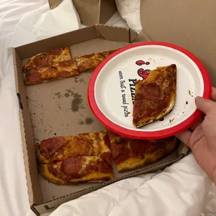 What&apos;s left of my not round pizza. So good!