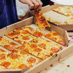Thin-n-crispy pizza with free delivery.  We specialize in pizza for a crowd!