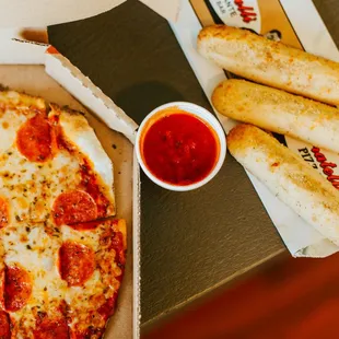 Make your pizza a meal with breadsticks, salads, beverages and desserts