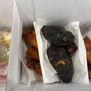 Our to-go order of TNT, Gim Ballad and Red Disco wings.