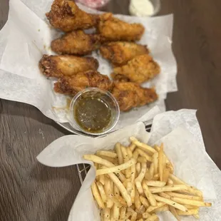Original Pop, Honey Luv Rap chicken wings and Anchovy Fries.