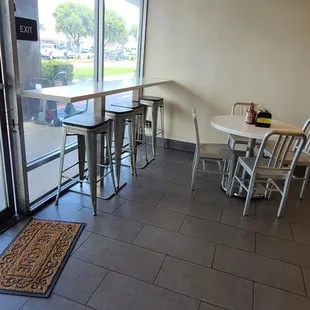 a table and chairs in a restaurant