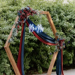Hexagon wooden arch, can be customized to events colors