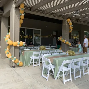 Green, gold and nude birthday decor