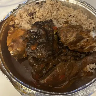 Make your mouth water Jerk Chicken w/ rice &amp; peas.. Spicy and delicious..