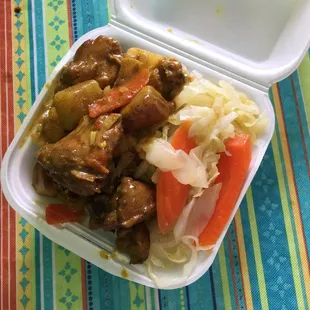 Small chicken curry with steamed cabbage and white rice...