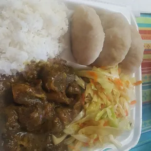 Curry goat and dumplings