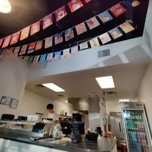 a man working in a sushi restaurant