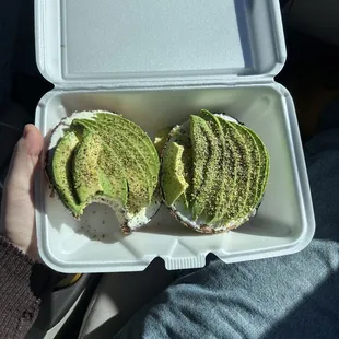 Open face combo bagel with cream cheese, avocado and lemon pepper
