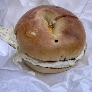 Jalapeño cheese bagel with garlic herb cream cheese, egg whites and turkey sausage