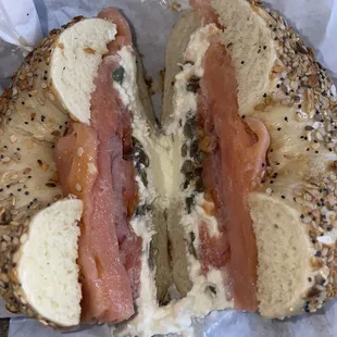 everything bagel with lox, cream cheese, capers, and red onion