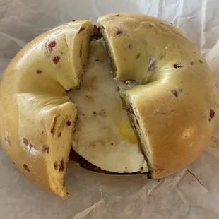Orange Cranberry Bagel with Butter and Egg.