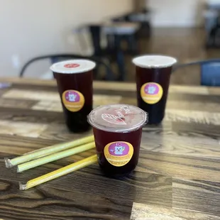 Flavored tea Winter melon black tea with double boba and Dragon fruit green tea with boba.