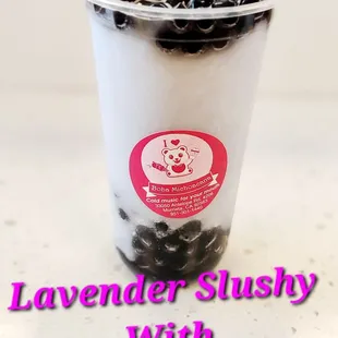a cup filled with blackberries