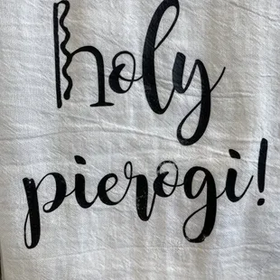 a towel with the words holly pierogi