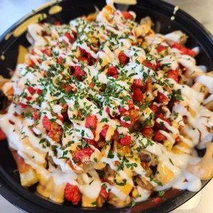 Buffalo chicken cheese fries with hot cheetos