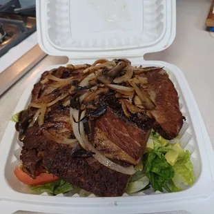Brisket salad with avocado add-on.  Lettuce &amp; avocado buried by the huge pieces of meat