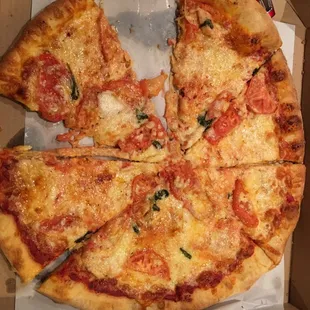 &quot;Margarita&quot; pizza - barely any basil, way too greasy, shredded cheese instead of traditional sliced mozzarella, too soggy.