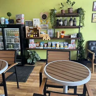 Selection of local honey, bee pollen, GF, Vegan options in cooler for quick pick foods and drinks