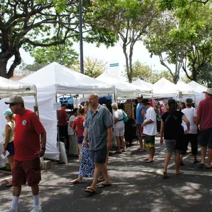 a crowd of people walking around