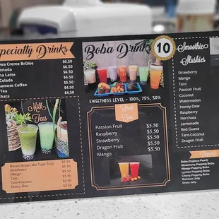 a hand holding a menu