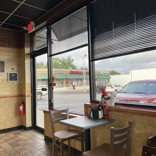 a table and chairs in a restaurant