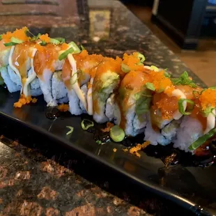 #22 Salmon Roll.  Inside: Tempura shrimp &amp; crab. Outside: Salmon, Avocado &amp; Roe