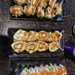 Top-Crispy Creme Sushi Roll Middle- Cali Fried Roll Bottom- Ahra's Roll