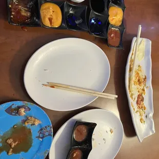 Plates that never got picked up. There were more, but I put them aside on the corner. Decent food though. I will be back.