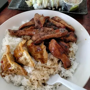 Lunch special chicken teriyaki, goyza and California roll.