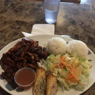 Spicy chicken with an egg roll. Really good and really big portions