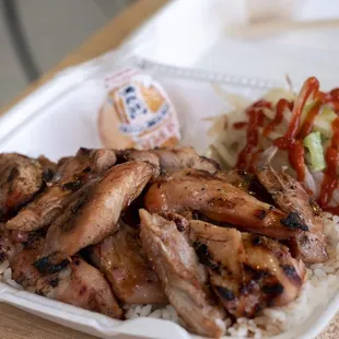 Chicken Teriyaki (sauced) w/ rice &amp; steamed vegetables. If you like heat, we recommend eating the veggies w/ Sriracha as shown here!