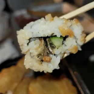 a close up of a piece of sushi