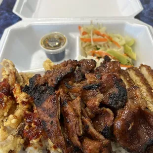 Deluxe Combo with Pork Teriyaki, Calamari, and Sesame Chicken