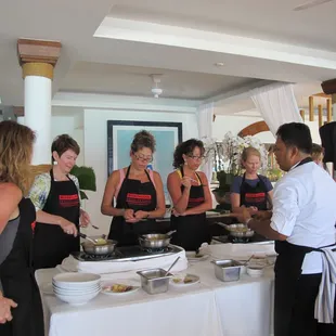 Culinary tour members learned how to cook Thai foods with local chef. In Phuket - The Boat House Cooking School