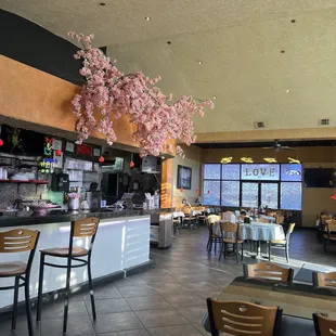 a restaurant with tables and chairs