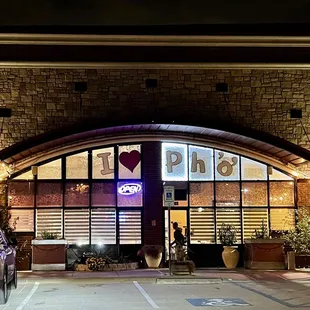 a car parked in front of a restaurant