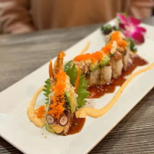 a plate of sushi on a table