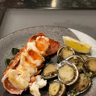 a plate of lobster and clamsel