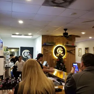 people sitting at a bar