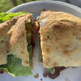 a sandwich cut in half on a plate