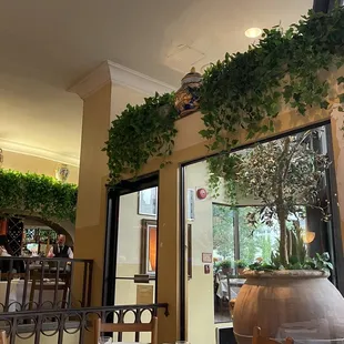 a dining room with a table and chairs