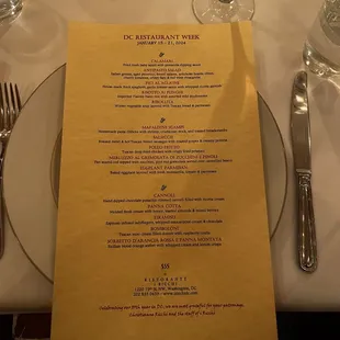 a table setting with a menu