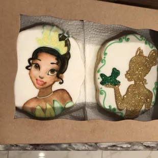 two decorated cookies