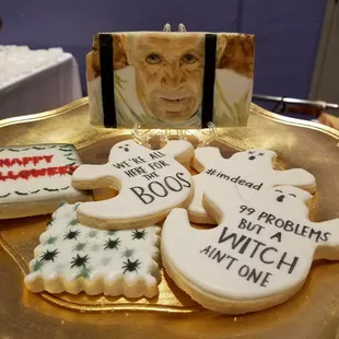 a plate of decorated cookies
