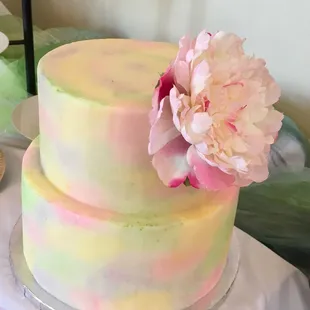 a cake with a flower on top