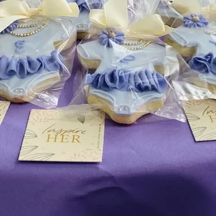 Baby shower cookies! Naomi did an outstanding job with the light purple and dark purple onsie!! It was an absolute hit at the baby shower!!